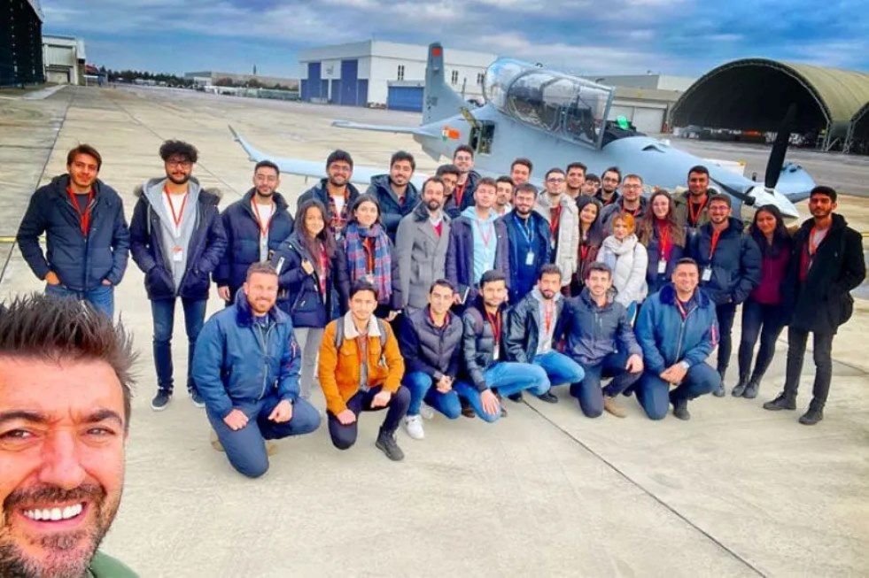 Turkish Test Pilot Murat Ozpala and TUSAS' Hurkus team seen on Niger's Hurkus aircraft
